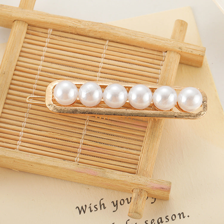 Slip-on Pearl Bow Haar Clip