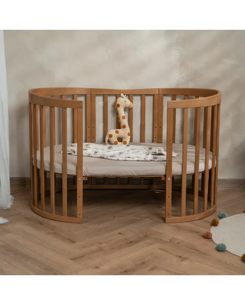 Babybett 7-in-1 – Ein Bett für viele Jahre - mitwachsend | Ovale Form