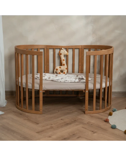 Babybett 7-in-1 – Ein Bett für viele Jahre - mitwachsend | Ovale Form