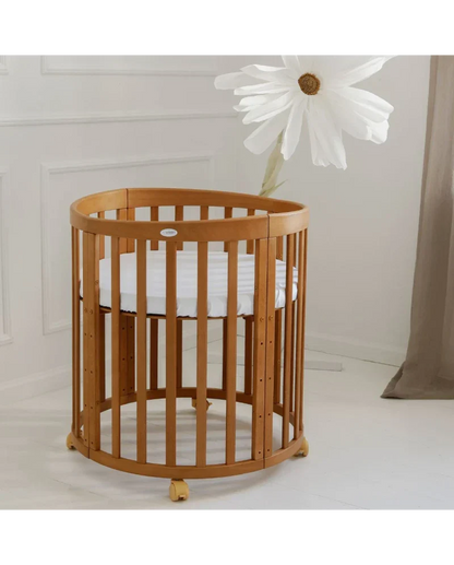 Babybett 7-in-1 – Ein Bett für viele Jahre - mitwachsend | Ovale Form